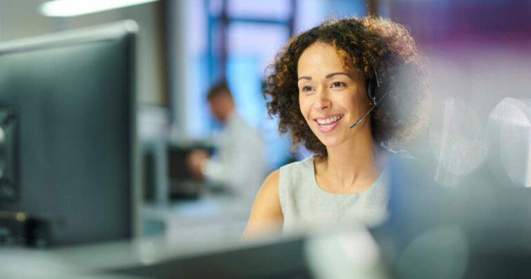 customer service team member smiling on a call