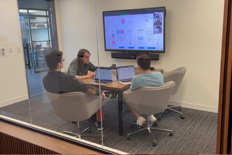 Software Team Collaborating in a Breakout Room
