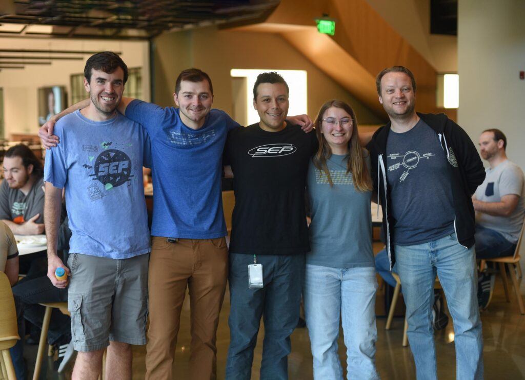 Group of SEP Employees having fun and smiling at the camera.
