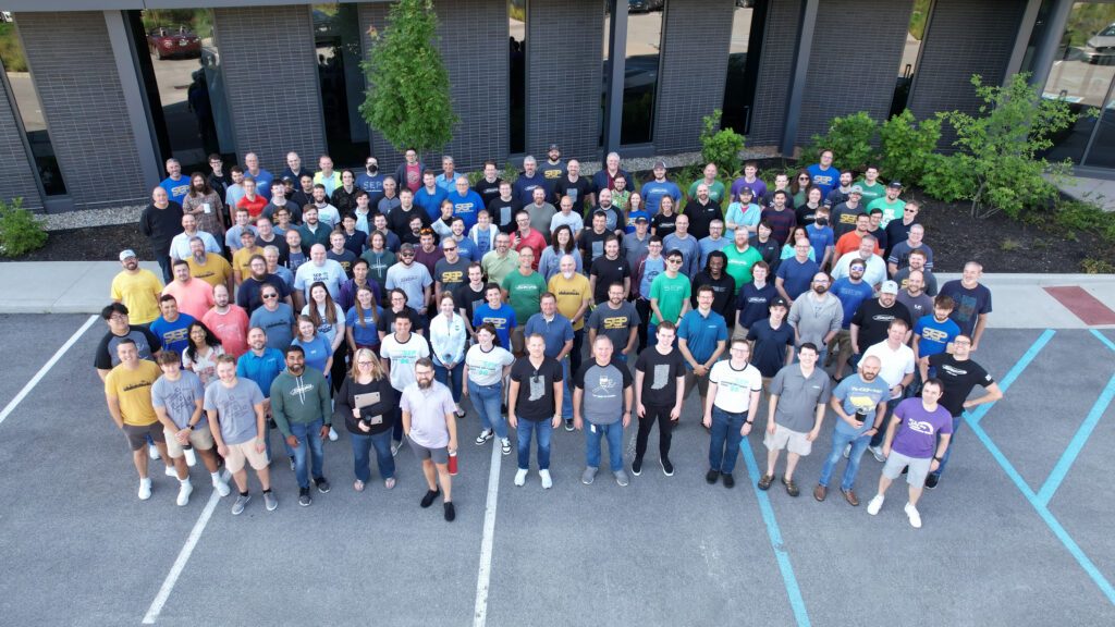 SEP Employees standing in front of SEP headquarters, shot from above by drone.