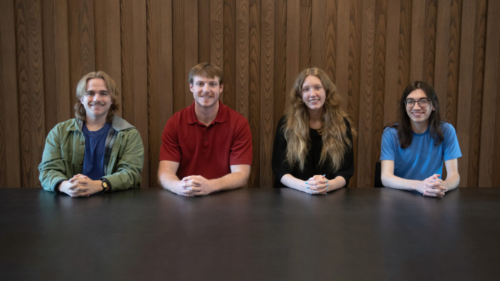 SEP interns sitting across the table